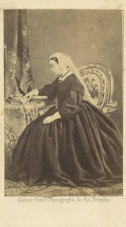 Portrait of Queen Victoria seated, gazing at a photograph of Prince Albert; Ghémar Frères, active 1860s, Brussels, Belgium