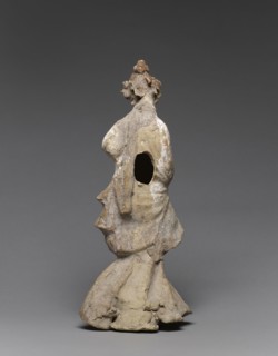 Statuette of a Dancer; Tarentum, Taras, South Italy; 400 - 200 B.C; Terracotta with white slip, white lead, and polychromy