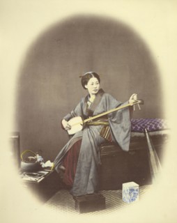 Girl Playing the Samisen; Felice Beato, 1832 - 1909, Japan; 1866 - 1867; Hand-colored Albumen silver print
