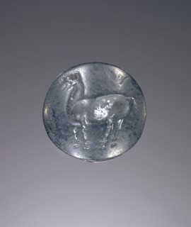 Lentoid engraved seal; Crete, Greece; about 1550 B.C. - 1400 B.C; Haematite; 1.6 × 0.7 cm, 5,8 × 1,4 in