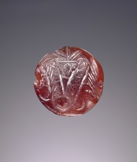 Lentoid engraved seal; Crete, Greece; about 1700 B.C. - 1450 B.C; Carnelian; 0.8 × 1.8 cm, 5,16 × 11,16 in