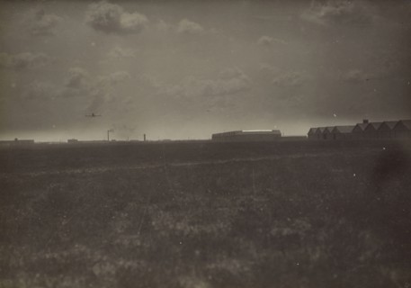 Flying airplane; Fédèle Azari, Italian, 1895 - 1930, Italy; 1914 - 1929; Gelatin silver print; 11.5 x 15.4 cm