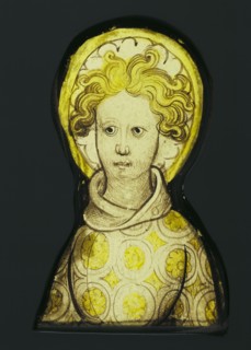 Angel; English; Midlands?, England; about 1420 - 1430; Colorless glass, vitreous paint, and silver stain; 14.5 x 9 x 1 cm