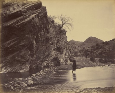 Man standing in water near river; John Burke, British, active 1860s - 1870s, Afghanistan; 1878 - 1879; Albumen silver print