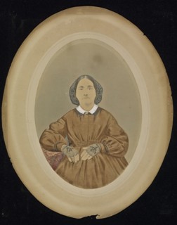 Portrait of a woman; American; about 1850 - 1860; Hand-colored salted paper print; 19 × 13.5 cm, 7 1,2 × 5 5,16 in