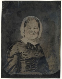 Portrait of woman in white hat; United States; 1860s - 1880s; Hand-colored tintype; Sheet: 21.2 x 16.4 cm, 8 3,8 x 6 7,16 in