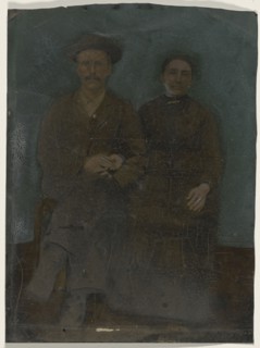 Portrait of couple; United States; 1860s - 1880s; Hand-colored tintype; Sheet: 20.2 x 14.9 cm, 7 15,16 x 5 7,8 in
