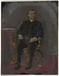 Portrait of seated man; United States; 1860s - 1880s; Hand-colored tintype; Sheet: 21.1 x 16.6 cm, 8 5,16 x 6 9,16 in