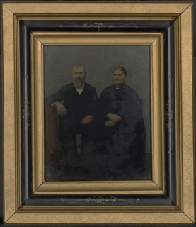 Portrait of seated couple; United States; 1860s - 1880s; Hand-colored tintype; 24 × 18.8 cm, 9 7,16 × 7 3,8 in