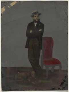 Portrait of man and dog; United States; 1860s - 1880s; Hand-colored tintype; Sheet: 21.7 x 16.1 cm, 8 9,16 x 6 5,16 in