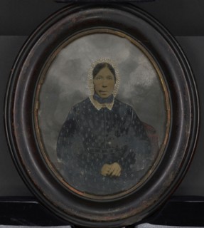 Portrait of woman in bonnet; United States; 1860s - 1880s; Hand-colored tintype; 23.8 × 19 cm, 9 3,8 × 7 1,2 in