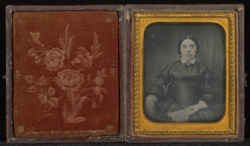 Portrait of a Woman in a Black Dress Seated and Holding a Fan; Mexico; 1856; Hand-colored Daguerreotype