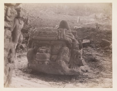 Warrior-head sculpture with pith helmet placed on top, Edmund Lincoln miscellaneous papers relating to the excavation of Maya