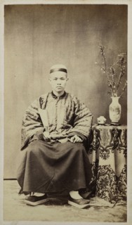 Seated Chinese man; recto, collection of photographs of China and Southeast Asia, Ye-Chung, ca. 1860