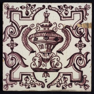 Tile, purple on white, vase with round floral ornaments, framed by régence decoration, wall tile tile sculpture ceramic