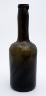 Cylindrical bottle, bottle holder bottomfound glass, hand-blown glass application Cylindrical bottle in clear brown-green glass