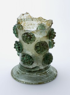 Fragment of soil, stem and calyx of roemer, roemer drinking glass drinking utensils tableware holder soil find glass forest