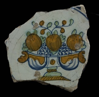Fragment of the majolica dish, polychrome, fruit bowl on foot with grapes and apples, plate crockery holder soil find ceramic