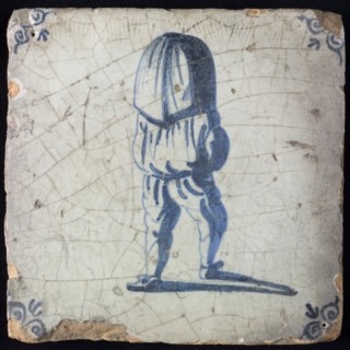 Occupation tile, blue with sack carrier seen on the back, corner motif ox's head, wall tile tile sculpture ceramic earthenware