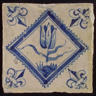 Tile, tulip on ground within serrated square, in blue on white, corner pattern french lily, wall tile tile sculpture ceramic