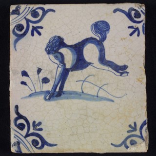 Animal tile, trailing horse on the ground, in blue on white, corner motif large ox-head, wall tile tile image ceramics pottery
