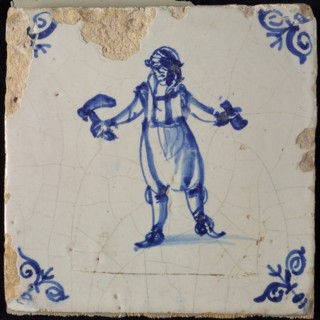 Occupation tile, blue with man pickaxe, corner motif ox's head, wall tile tile sculpture ceramic earthenware glaze wood, baked