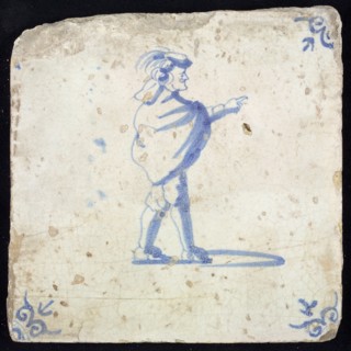 Figure tile, blue with pointing nobleman 'and profile', corner motif ox's head, wall tile tile sculpture ceramic earthenware
