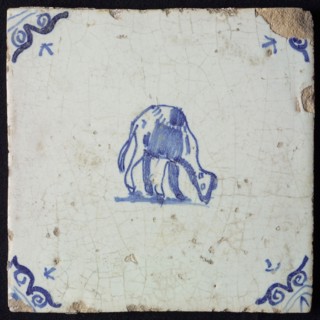 Animal tile, standing dromedary with head down to the right, in blue on white, corner pattern ox head, wall tile tile sculpture