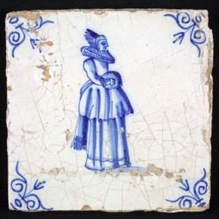 Figure tile, blue with nicely dressed lady with millstone collar, slipped skirt and sleeve, corner pattern ox head, wall tile