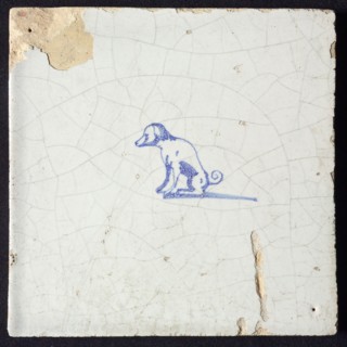 Animal tile, sitting dog to the left, in blue on white, without corner motif, wall tile tile sculpture ceramic earthenware glaze