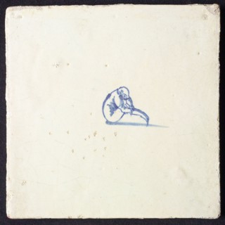 Animal tile, sitting unknown animal to the right, in blue on white, without corner motif, wall tile tile sculpture ceramic