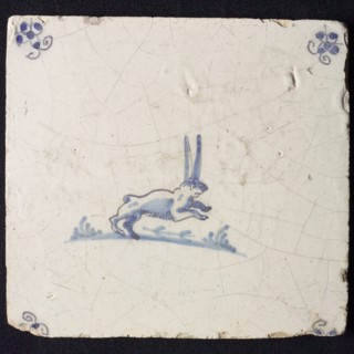 Animal tile, jumping hare to the right, in blue on white, corner motif spider, wall tile tile sculpture ceramic earthenware