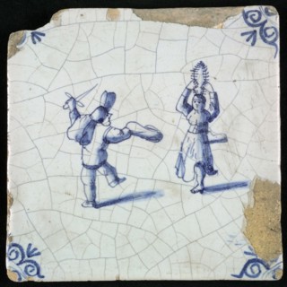 Figure tile, blue with dancing couple, man has sword, the woman holds branches or feathers above her head, corner pattern ox