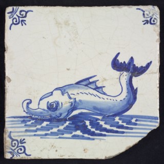 Animal tile, sea-washed in continuous water to the left, in blue on white, corner motif of ox-head, wall tile tile sculpture