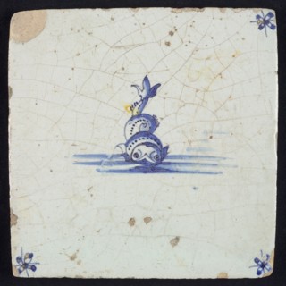 Animal tile, fish with double wound tail in water, in blue on white, corner motif spider, wall tile tile sculpture ceramic