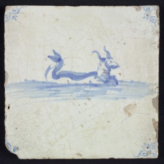 Sea creature tile, bovine with horns and curled fish tail in running water to the right, in blue on white, corner motif oxen