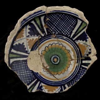 Fragment majolica plate, polychrome, with rosette, grid and checkered borders, plate dish crockery holder soil find ceramic