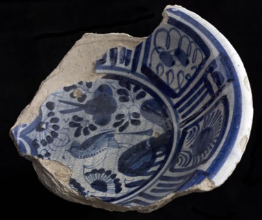 Fragment majolica bowl or saucer, blue on white, with bird in Chinese garden, rim in Wanli style, bowl dish crockery holder soil