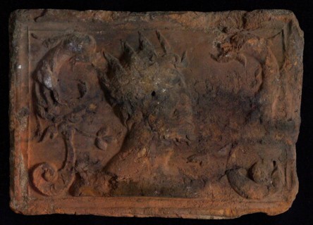 Hearthstone, from Antwerp Belgium, with narrow frame, with crowned man and dolphinvoluten, hearth fireplace part ceramic brick