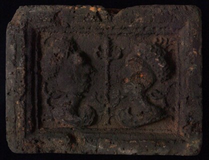 Hearthstone, Luiks, from Luik, Liege Belgium, with wide frame, with male and female head, hearth fireplace part ceramic brick