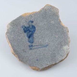 Fragment faience dish, blue on white, one standing Chinese in the middle, dish plate crockery holder earth discovery ceramic