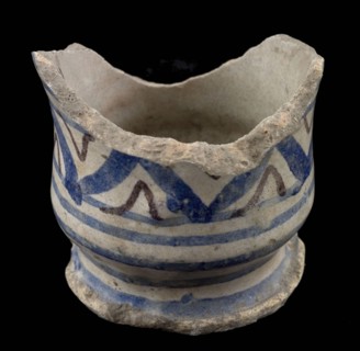 Fragment majolica albarello, ointment jar, polychrome decoration on white background, albarello holder earthenware pottery