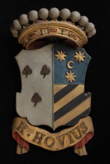 Carved wooden crowned coat of arms including the name H. Hovius, coat of arms informative form carvings sculpture visual