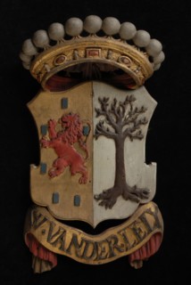 Carved wooden crowned coat of arms including the name W. Van der Lely, coat of arms information form carvings sculpture footage