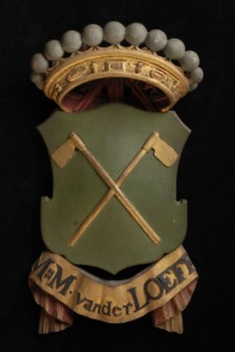Carved wooden crowned coat of arms including the name M.M. Van der Loeff, coat of arms information form carvings sculpture