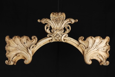 Carved wooden arched profile with three palmetal ornaments, ornament wood carving sculpture visual material wood paint