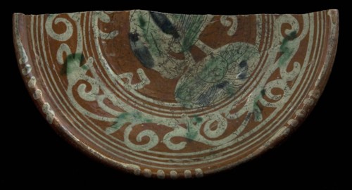 Fragment Werra plate, mirror decor with bird and plant, year 1612, pale yellow and green glaze, plate crockery holder earth
