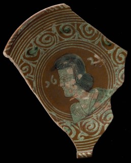Fragment Werra plate, mirror finish bust of man, year 1621, pale yellow and green glaze, edge decor voluten, plate crockery