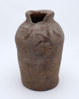 Pottery pot on stand, cylindrical with small neck opening, used in sugar production, sugar pot pot holder earth discovery