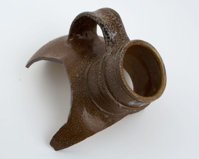 Neck fragment of bullet round stoneware jug with ear, jug crockery holder soil find ceramic stoneware glaze salt glaze, hand